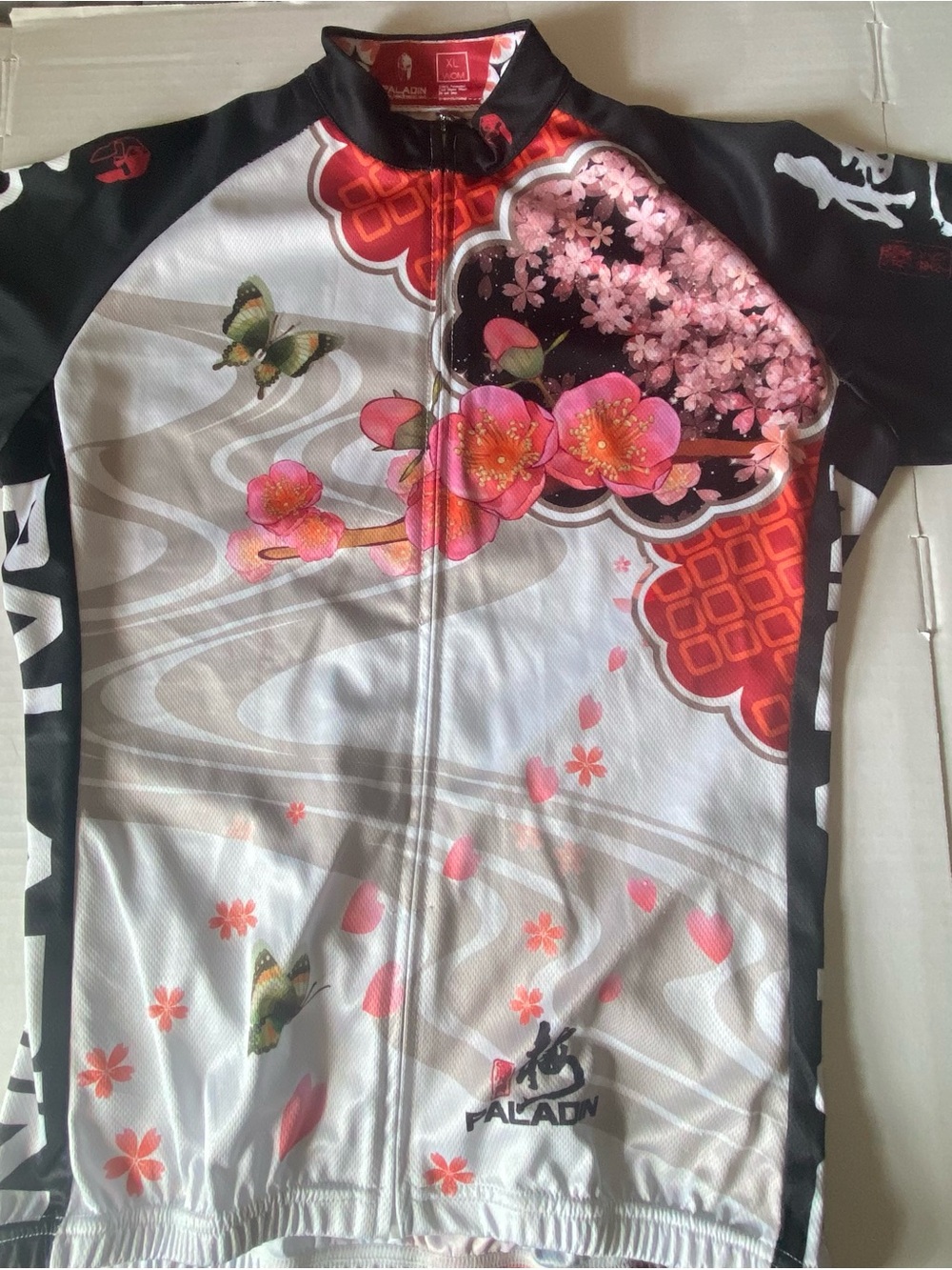 PALADIN Women’s Floral Zip-Front jersey in White and Pink